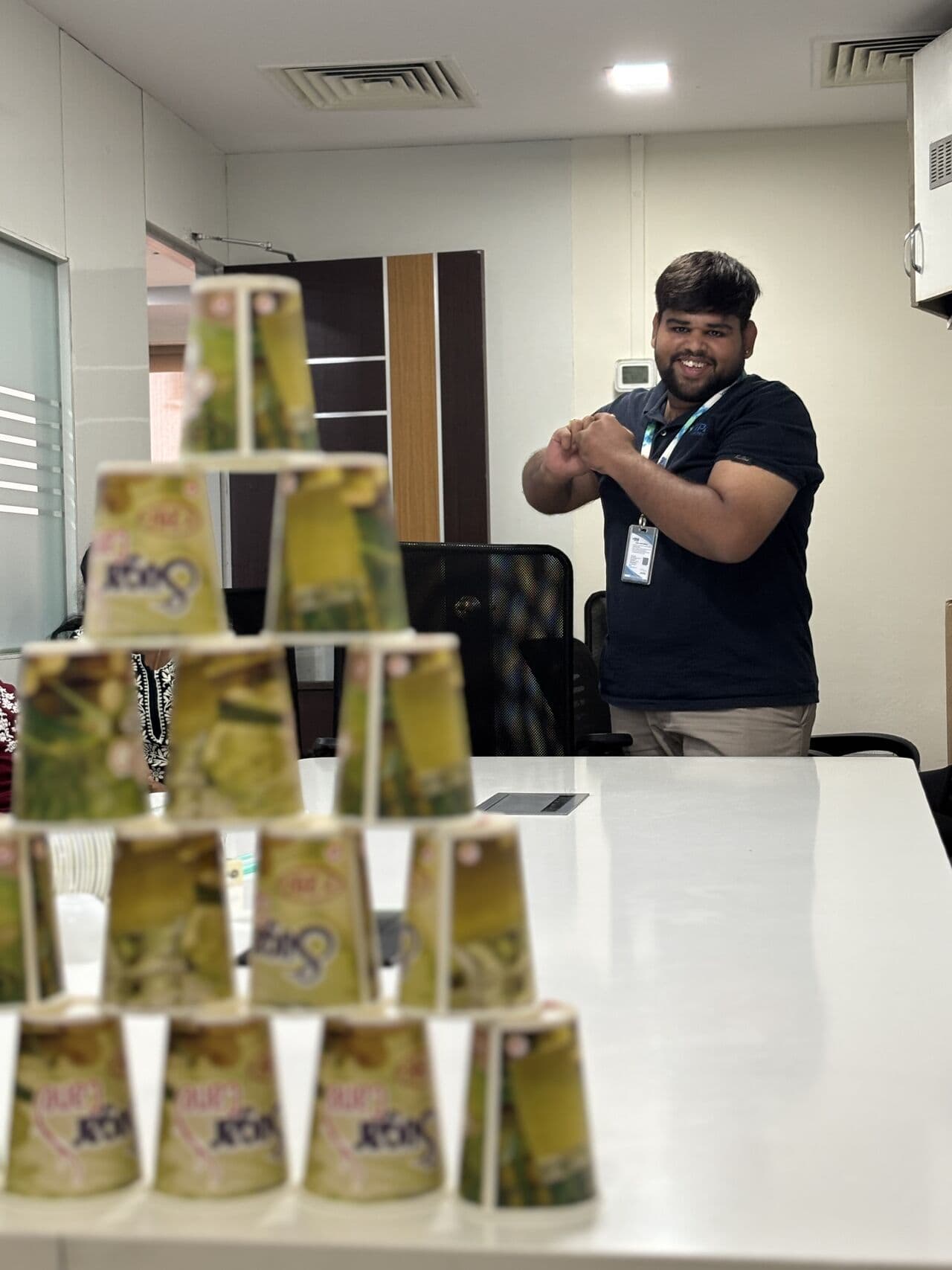 A colleague celebrating a successful round of the office game